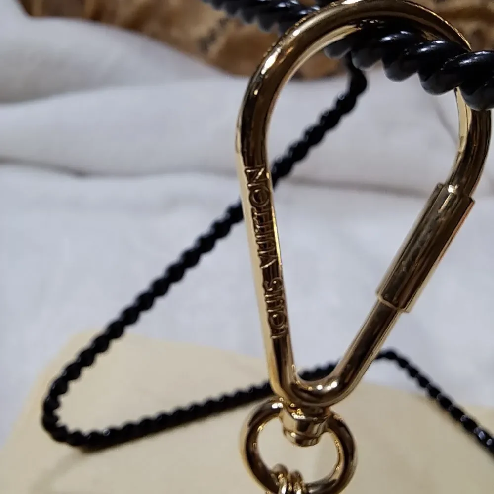 AUTHENTIC Louis Vuitton Puzzle Keyring with dustbag. NEW CONDITION